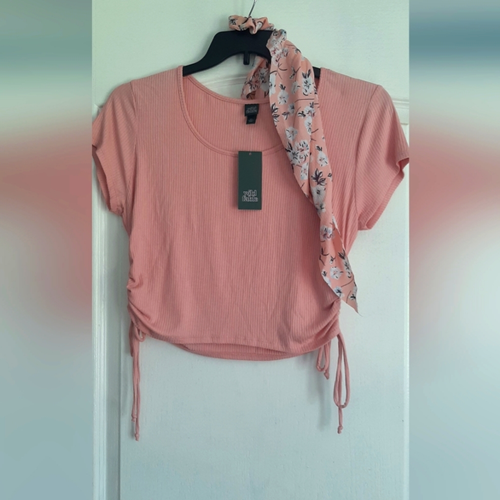 Pink crop top with matching hair tie